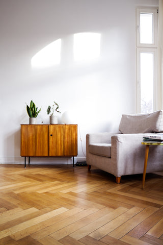 Room with herringbone wood flooring