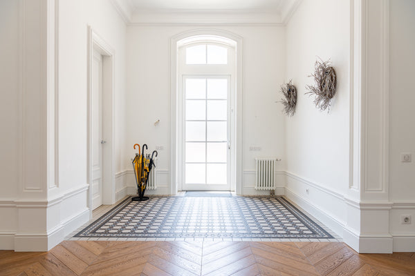 Entryway with black and white tile