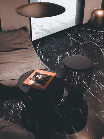 Room with black marble floor